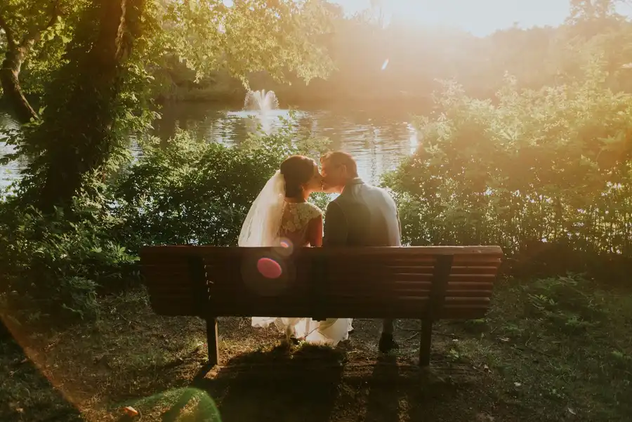 The last of the evening light on a garden bench after the toasts